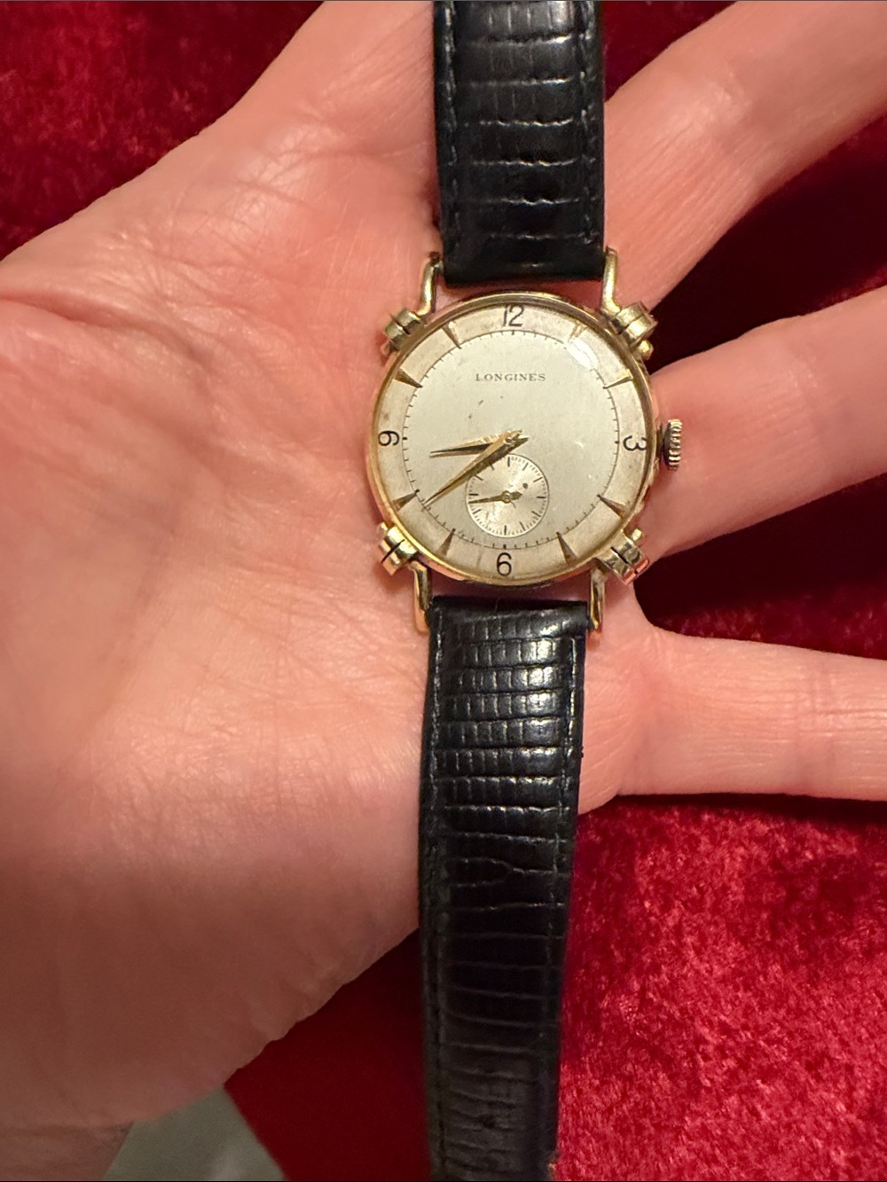 Vintage 14k gold case Longines watch; is running w genuine snake band; high end